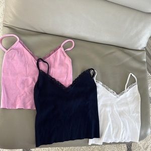 Brandy Melville tanks.